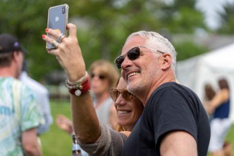 UNH alumni taking a selfie at reunion