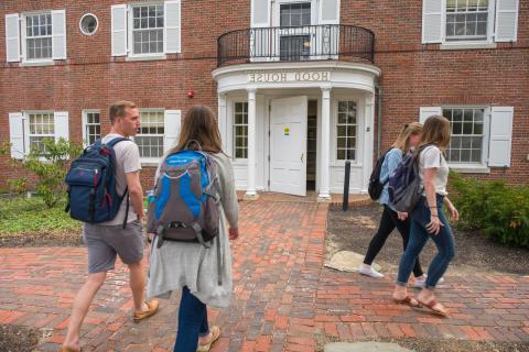 Two students entering Hood House